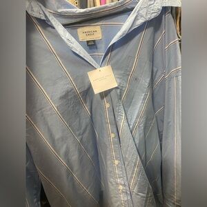 with tags over size button ups long and originally 50.00 a piece.